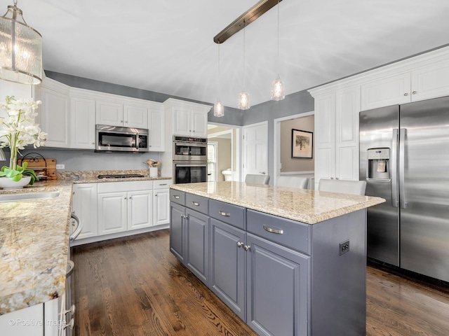 1301 Hawkins Ct, Saint Charles, IL 60174 - kitchen featuring white cabinetry, dark wood-style flooring, appliances with stainless steel finishes, and gray cabinetry