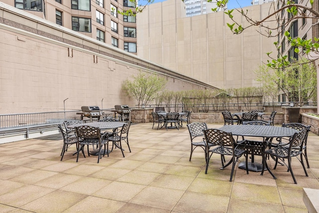 400 E Ohio St Unit 3203, Chicago, IL 60611 - view of patio featuring fence and outdoor dining space