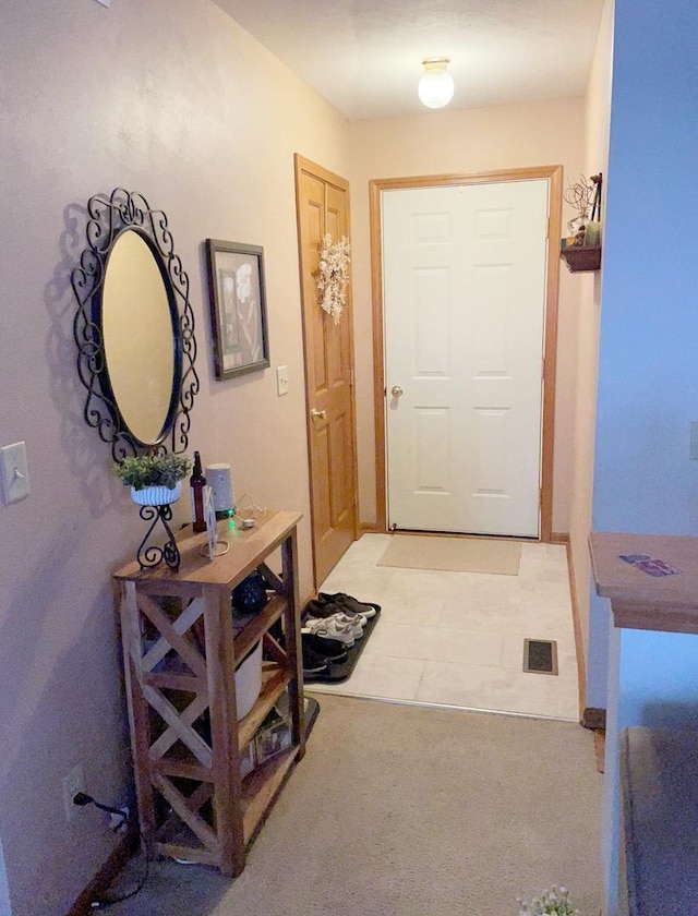 753 Golden Prairie Dr, Davis Junction, IL 61020 - entryway featuring light tile patterned flooring