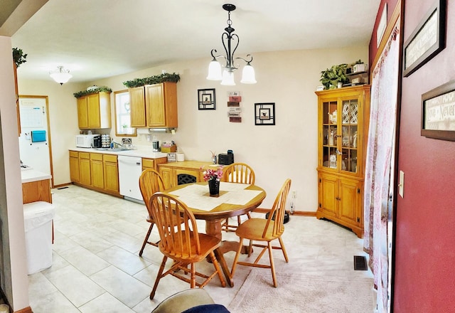 753 Golden Prairie Dr, Davis Junction, IL 61020 - dining space with a chandelier