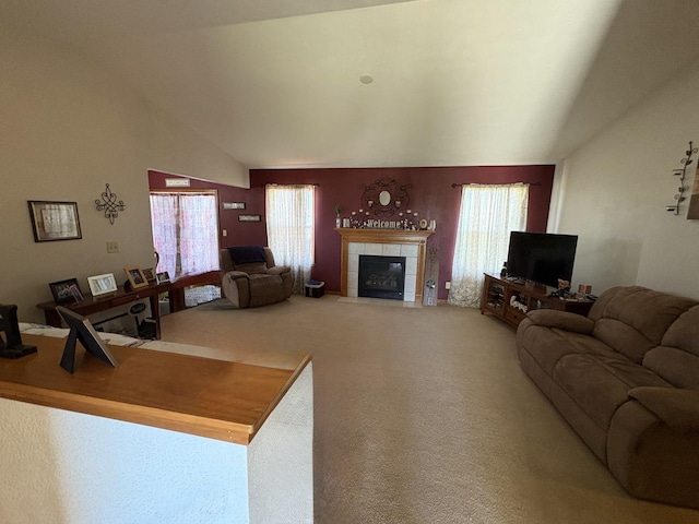 753 Golden Prairie Dr, Davis Junction, IL 61020 - carpeted living area with vaulted ceiling, healthy amount of natural light, and a tiled fireplace
