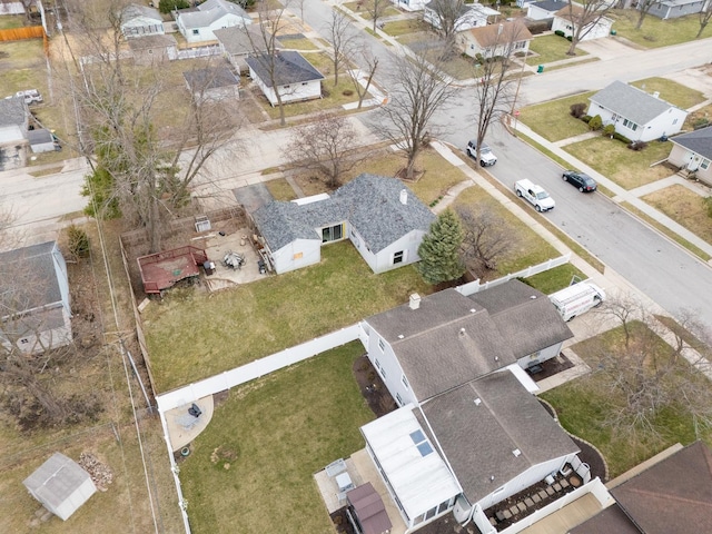 birds eye view of property with a residential view