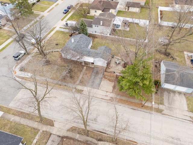 birds eye view of property with a residential view
