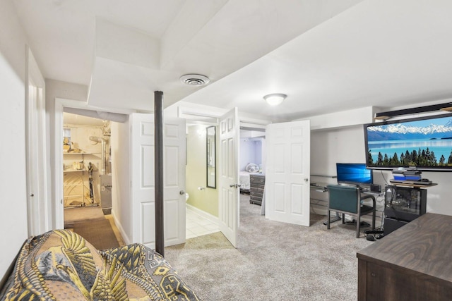 carpeted office space with visible vents