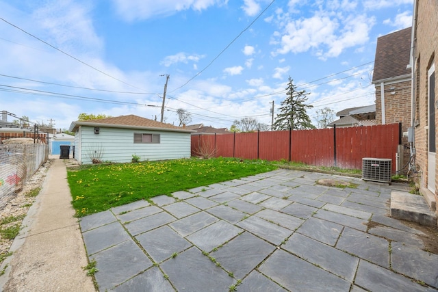 view of patio with cooling unit and a fenced backyard