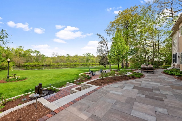2S546 Heaton Dr, Batavia, IL 60510 - surrounding community with a patio, a lawn, a water view, and outdoor dining space