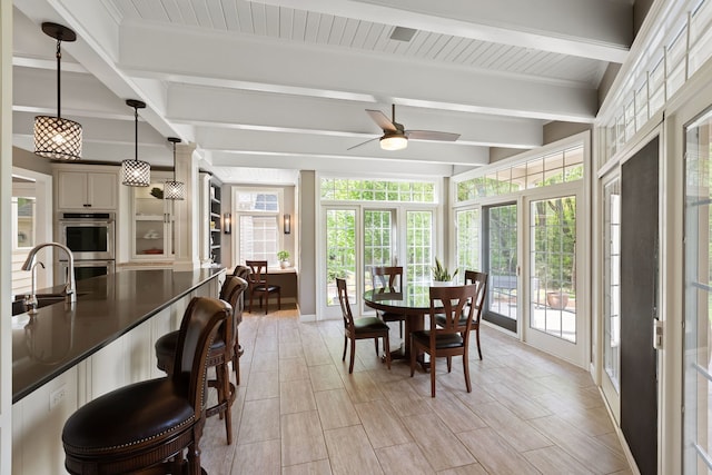 2S546 Heaton Dr, Batavia, IL 60510 - dining area with beam ceiling and a ceiling fan