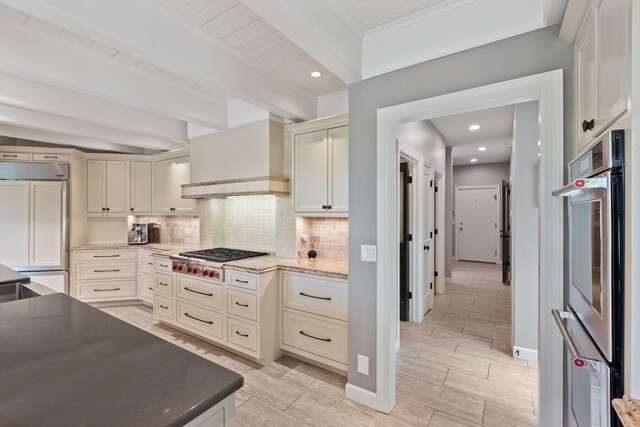 2S546 Heaton Dr, Batavia, IL 60510 - kitchen featuring appliances with stainless steel finishes, beamed ceiling, backsplash, dark stone countertops, and recessed lighting