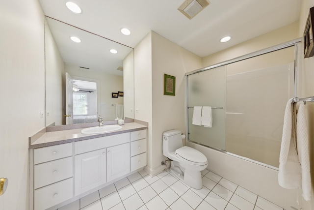 bathroom with tile patterned flooring, vanity, toilet, enclosed tub / shower combo, and visible vents