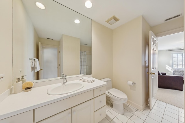 full bathroom featuring tile patterned flooring, vanity, toilet, recessed lighting, and visible vents