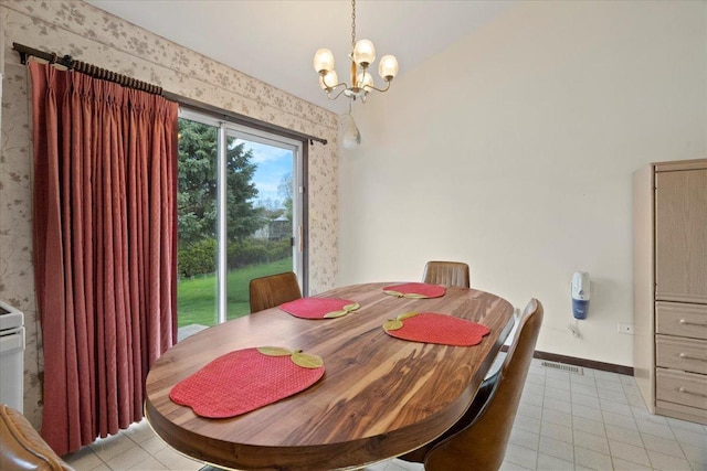 dining room featuring wallpapered walls, a chandelier, baseboards, and light tile patterned floors