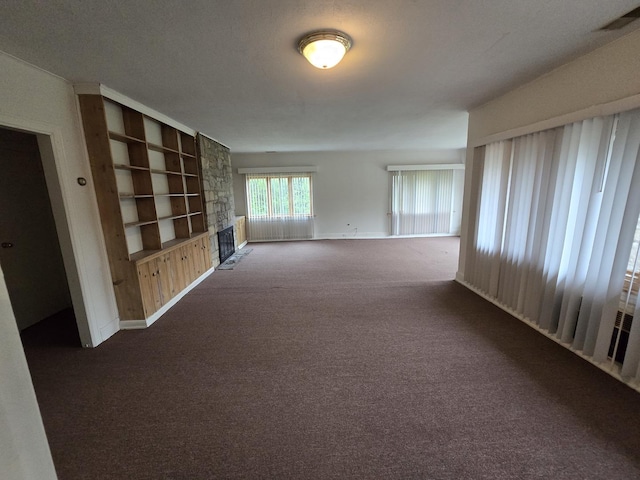 8401 W 129th St, Palos Park, IL 60464 - spare room featuring dark carpet, baseboards, visible vents, and built in shelves