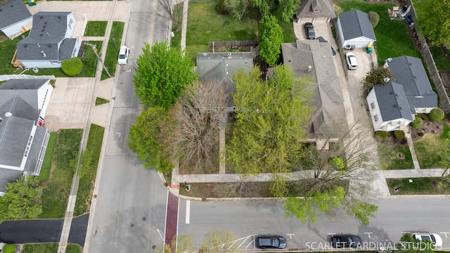 birds eye view of property with a residential view