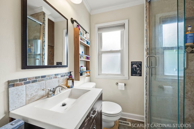 full bathroom with crown molding, vanity, visible vents, and a shower stall
