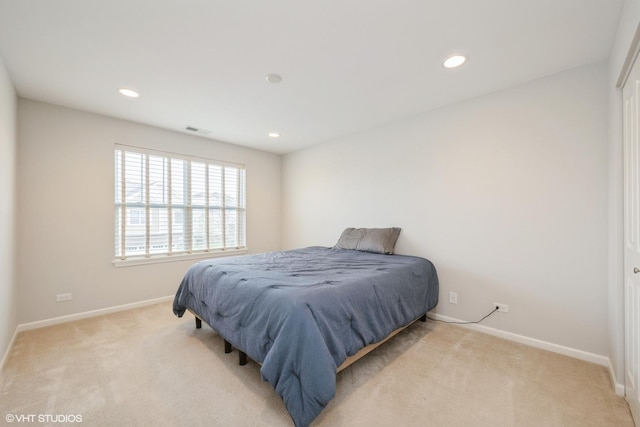 carpeted bedroom with visible vents, recessed lighting, and baseboards