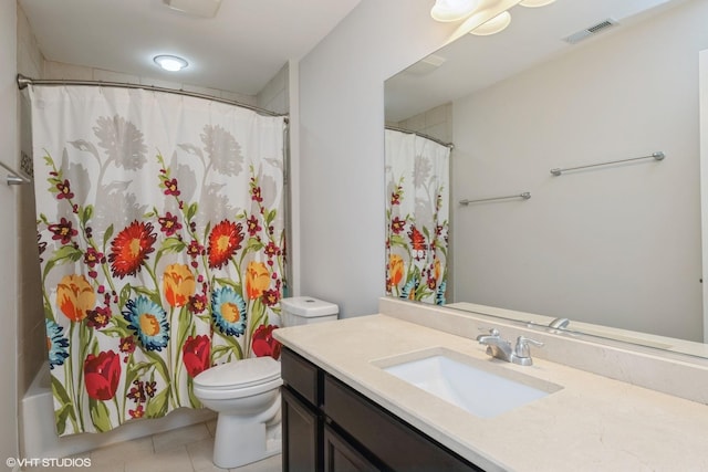 full bath featuring toilet, tile patterned floors, visible vents, and vanity