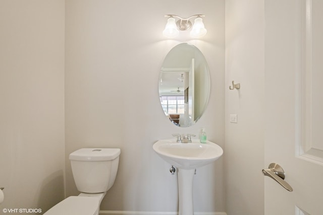 half bathroom with toilet