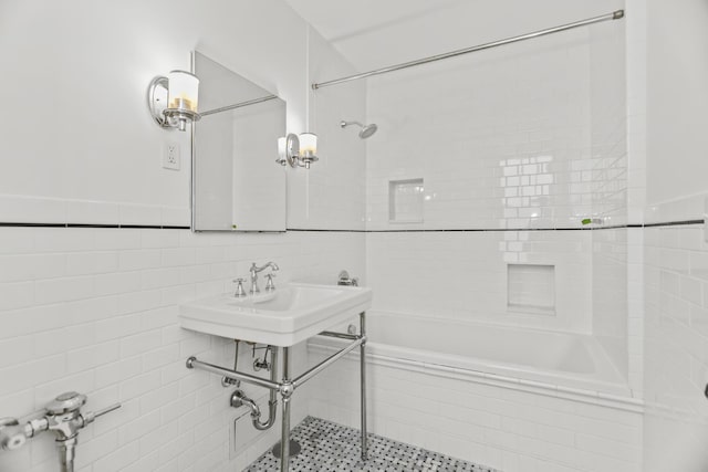 3300 N Lake Shore Dr Unit 12B, Chicago, IL 60657 - bathroom featuring tile walls and tiled shower / bath combo