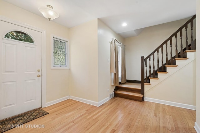 8712 N Central Ave, Morton Grove, IL 60053 - entrance foyer with hardwood / wood-style flooring, stairs, and recessed lighting