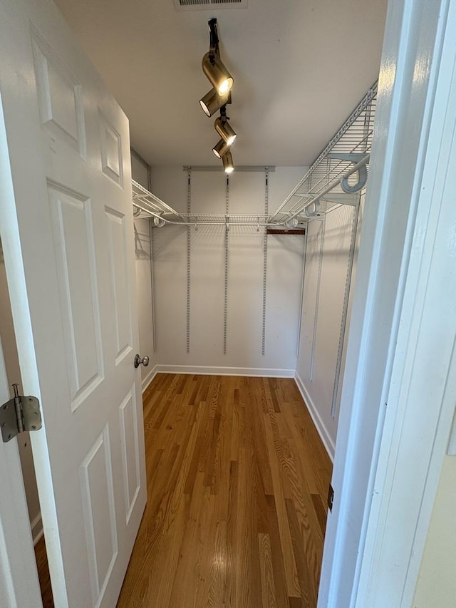 8712 N Central Ave, Morton Grove, IL 60053 - walk in closet with wood finished floors