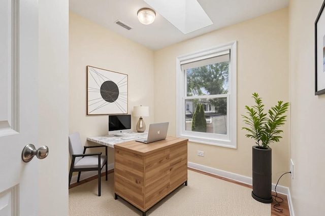 8712 N Central Ave, Morton Grove, IL 60053 - office area with a skylight and light wood-style flooring