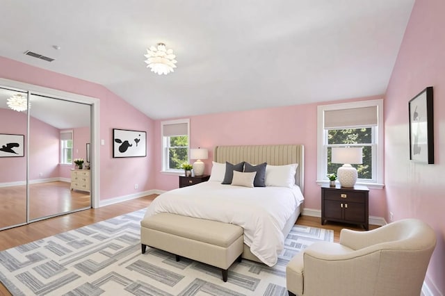 8712 N Central Ave, Morton Grove, IL 60053 - bedroom featuring lofted ceiling and wood finished floors