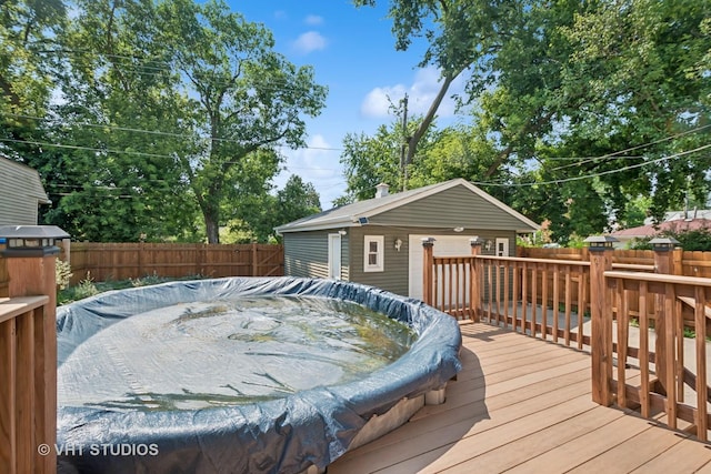 8712 N Central Ave, Morton Grove, IL 60053 - deck featuring a fenced backyard, an outdoor structure, and a hot tub