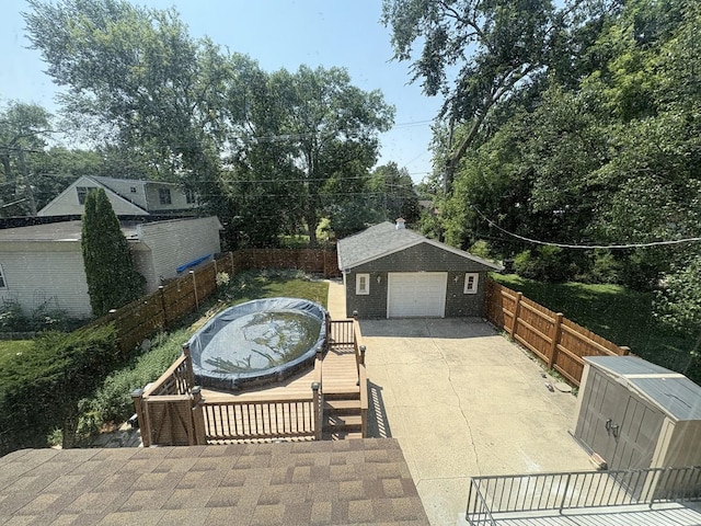 8712 N Central Ave, Morton Grove, IL 60053 - view of patio / terrace featuring an outdoor structure and concrete driveway