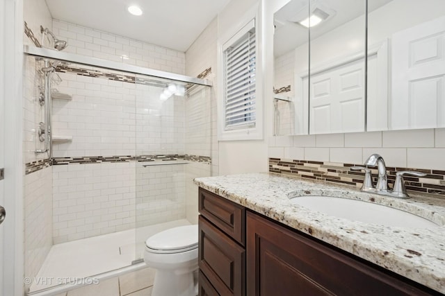8712 N Central Ave, Morton Grove, IL 60053 - full bath featuring vanity, a shower stall, tasteful backsplash, and recessed lighting