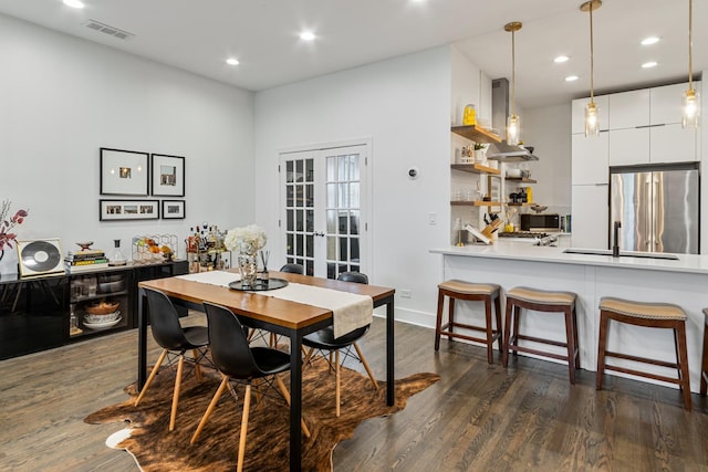 dining room featuring recessed lighting, visible vents, and dark wood-style floors