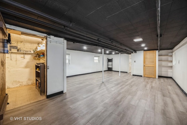 1521 Cuyler Ave, Berwyn, IL 60402 - basement featuring wood finished floors and baseboards