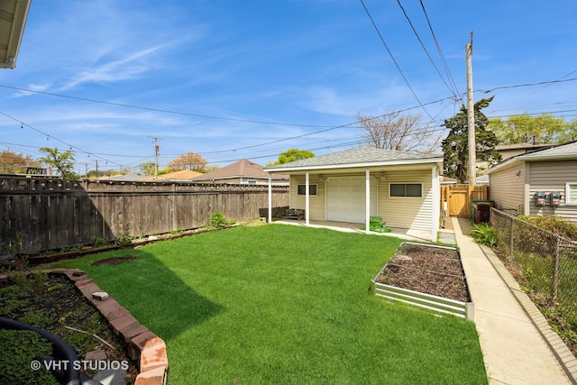 1521 Cuyler Ave, Berwyn, IL 60402 - view of yard with a garden, a detached garage, and an outdoor structure