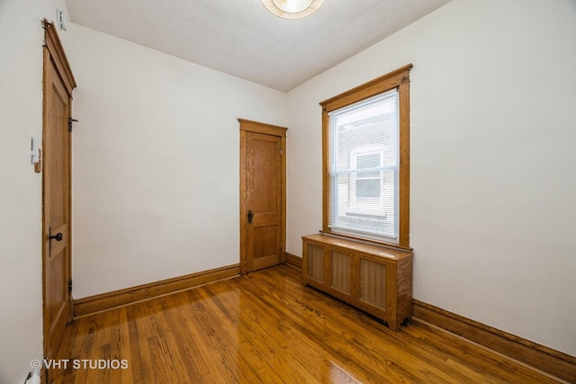1521 Cuyler Ave, Berwyn, IL 60402 - unfurnished room with wood finished floors and baseboards