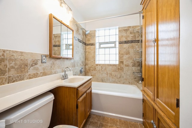 1521 Cuyler Ave, Berwyn, IL 60402 - bathroom with shower / bathtub combination, vanity, toilet, tile walls, and tile patterned flooring
