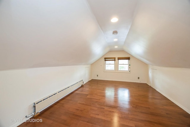 1521 Cuyler Ave, Berwyn, IL 60402 - bonus room with a baseboard heating unit, lofted ceiling, wood finished floors, and baseboards
