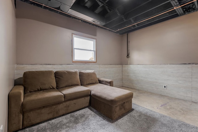 living room featuring visible vents and concrete floors