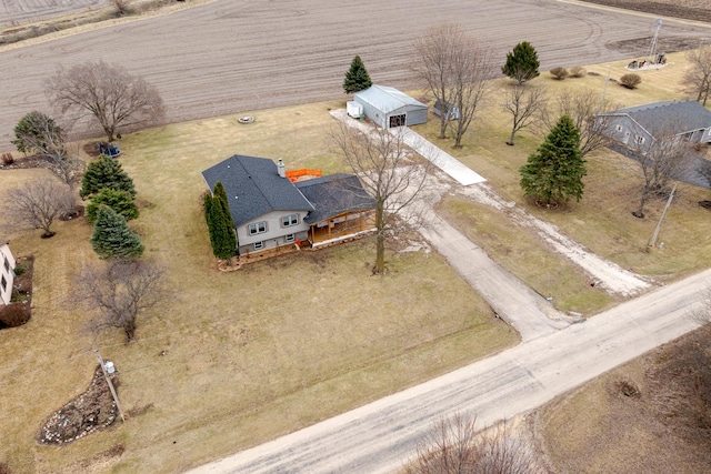 birds eye view of property featuring a rural view