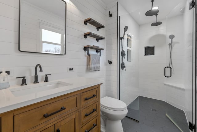 full bath featuring vanity, tile patterned flooring, a shower stall, and toilet