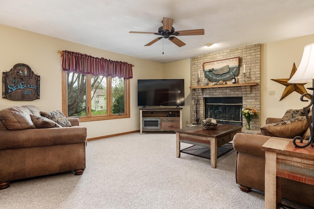 living area featuring a fireplace, carpet floors, ceiling fan, and baseboards