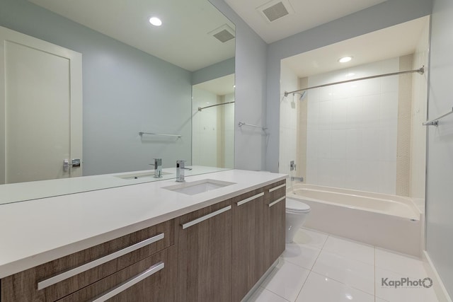 bathroom with visible vents, tile patterned floors, toilet, and vanity