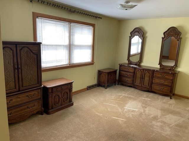 7236 W Olive Ave, Chicago, IL 60631 - unfurnished bedroom featuring light colored carpet, multiple windows, and visible vents