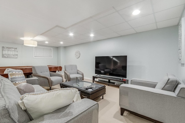 living room with recessed lighting, carpet flooring, and a paneled ceiling