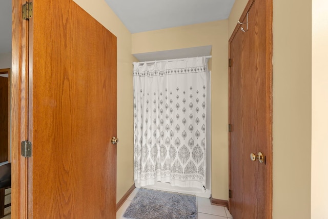 2739 Genoa Dr, New Lenox, IL 60451 - full bathroom with tile patterned flooring, a shower with shower curtain, and baseboards