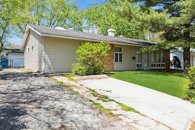 21822 Merrill Ave, Sauk Village, IL 60411 - single story home featuring a front lawn and a chimney