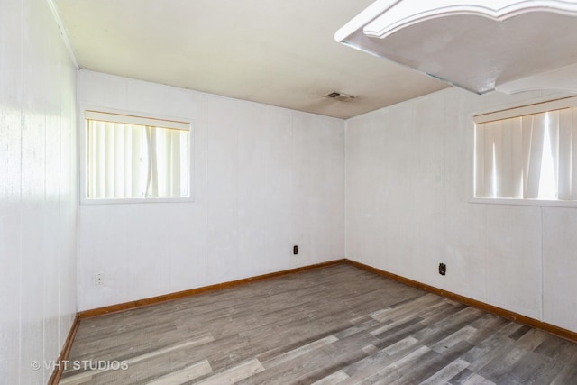 21822 Merrill Ave, Sauk Village, IL 60411 - unfurnished room featuring wood finished floors and baseboards