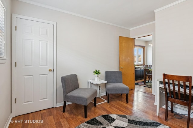 6223 S Rutherford Ave, Chicago, IL 60638 - living area featuring crown molding, baseboards, and wood finished floors