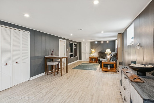 6223 S Rutherford Ave, Chicago, IL 60638 - living room featuring light wood-style floors, recessed lighting, and baseboards