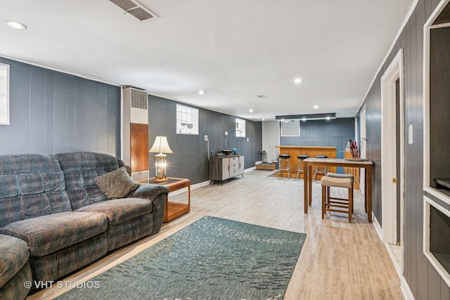 6223 S Rutherford Ave, Chicago, IL 60638 - living area featuring visible vents, baseboards, indoor bar, recessed lighting, and light wood-style flooring