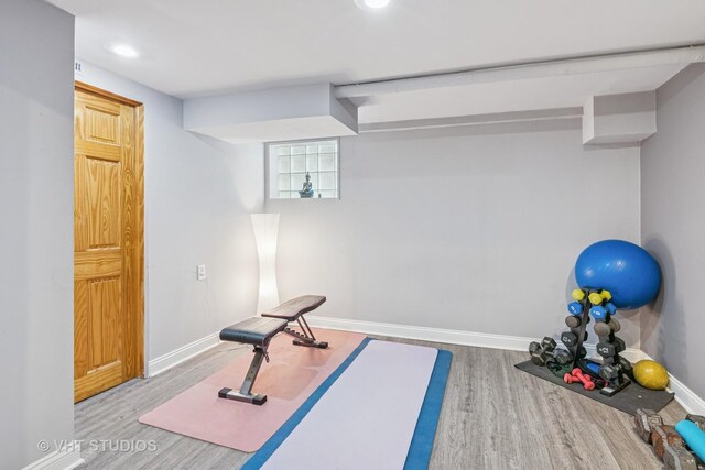 6223 S Rutherford Ave, Chicago, IL 60638 - workout room with recessed lighting, baseboards, and wood finished floors