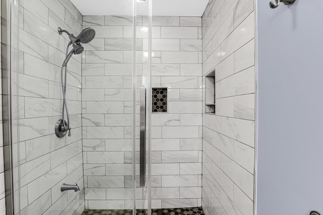 full bathroom with a shower stall
